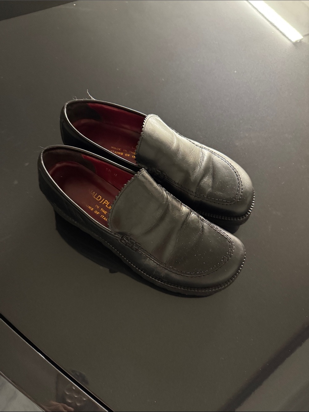 Donald J. Pliner Black Leather Slip-On Loafers with Burgundy Interior